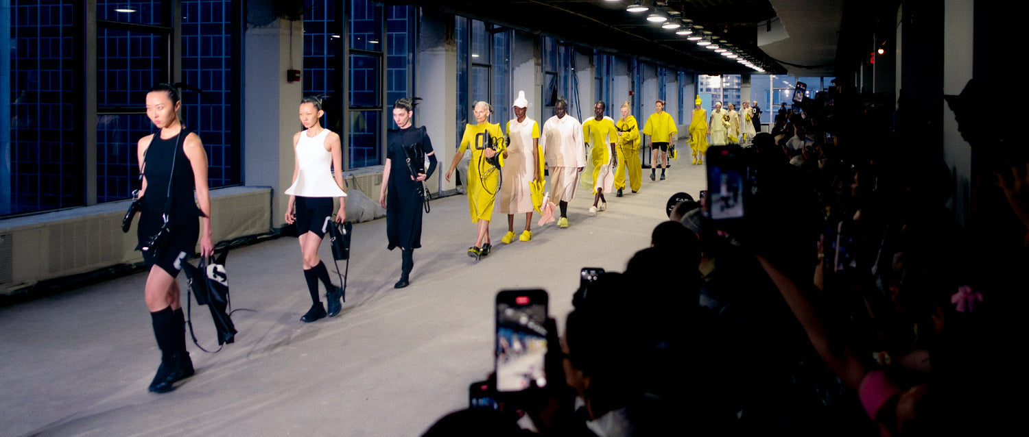 models-on-runway-audience-filming