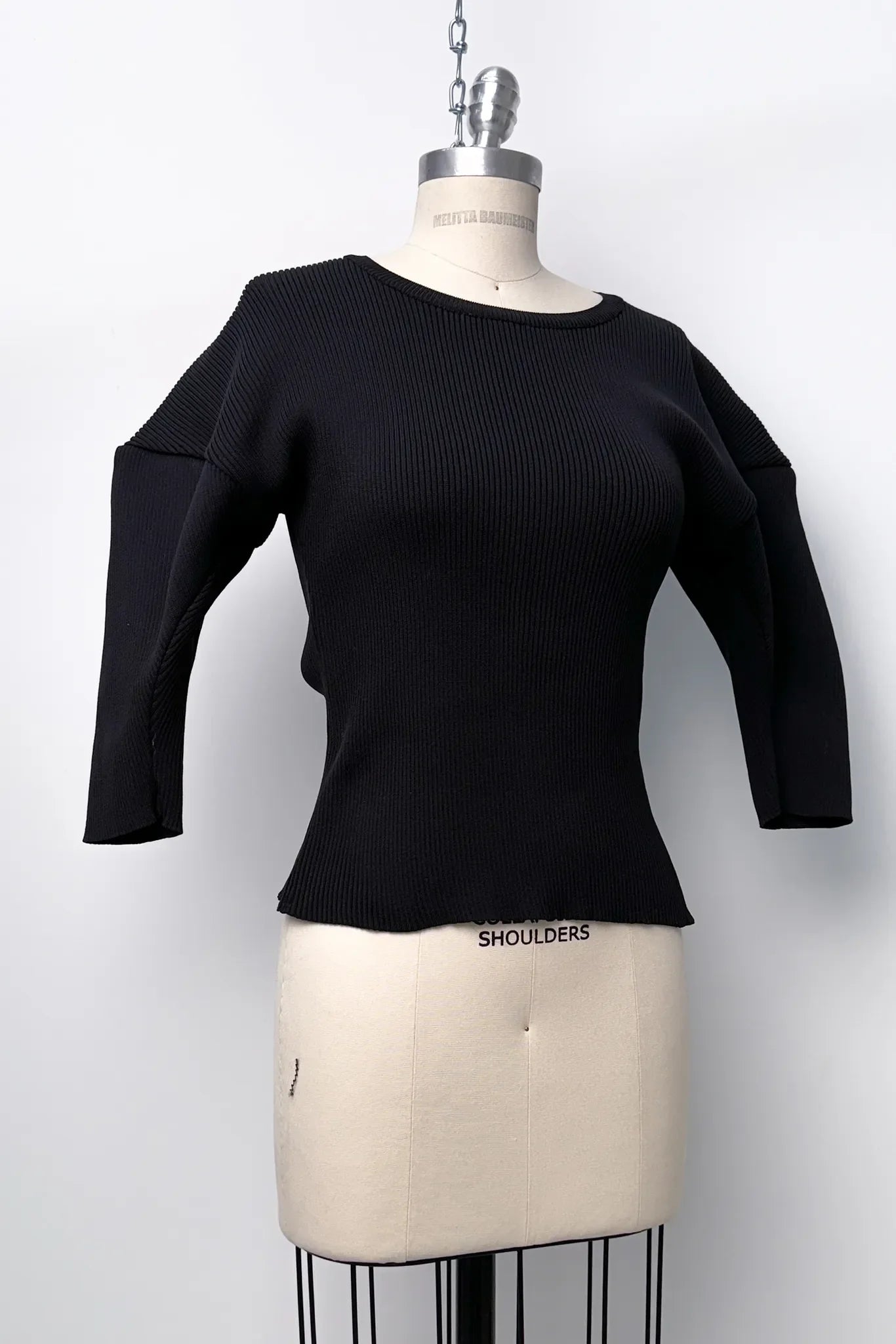 016 light ribbed top with sleeve volume detail
