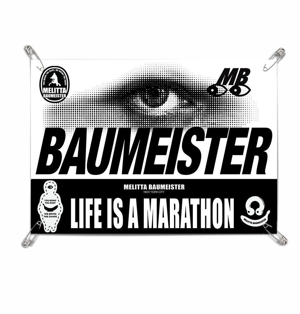 Baumeister runner's bib with a person's face and motivational text on a white background