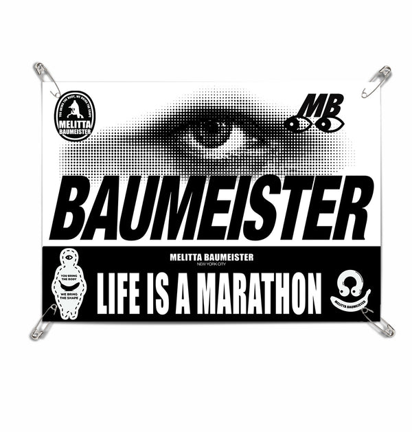 Baumeister runner's bib with a person's face and motivational text on a white background