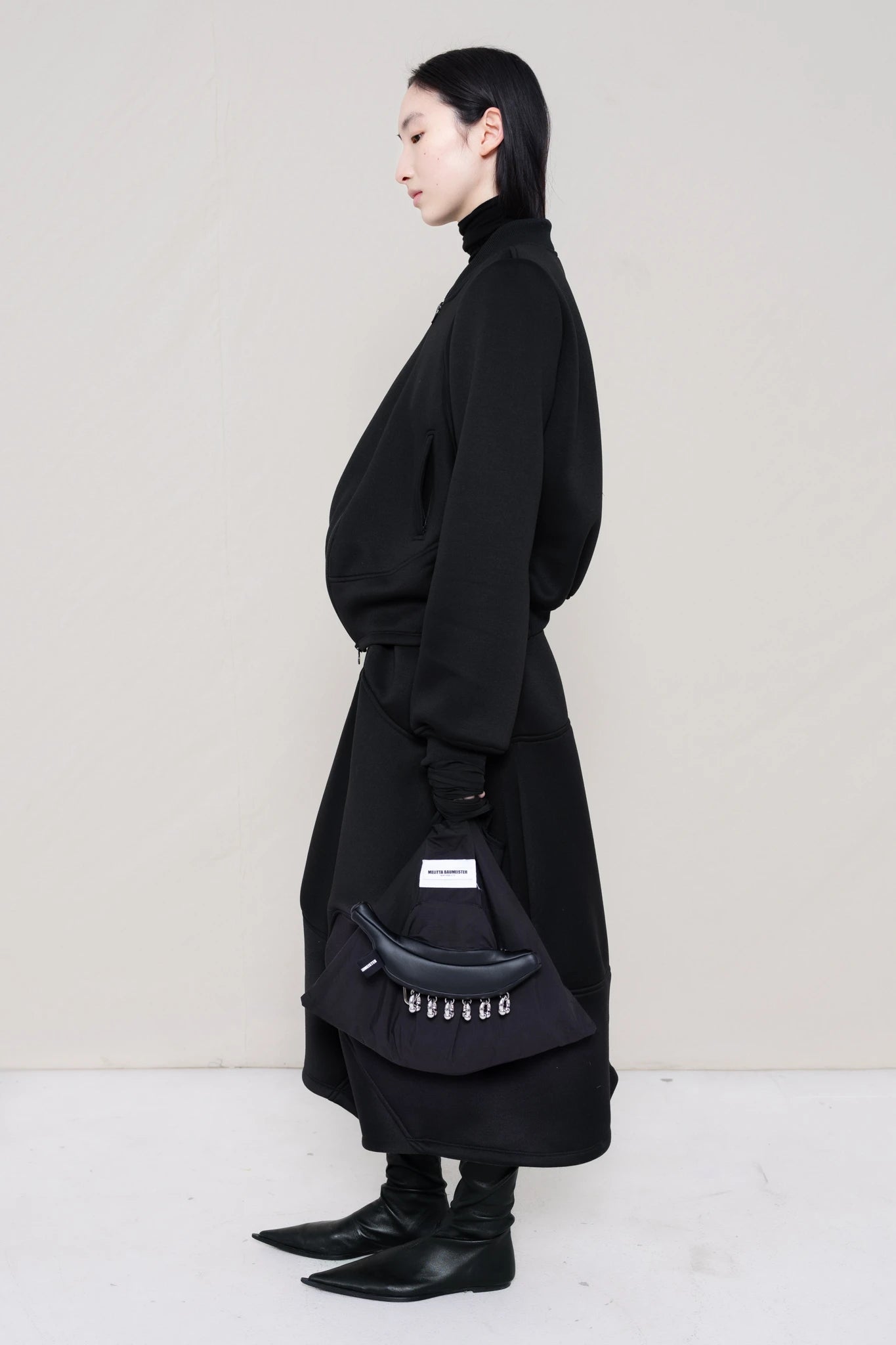 PIERCED BLACK BANANA TOTE BAG