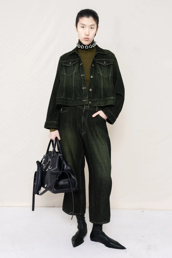 PERSON-WEARING-PIERCED-CHOKER-ON-MOSS-LONG-SLEEVE-TURTLENECK-UNDER-CROPPED-BLACK-YELLOW-WASH-SOFT-DENIM-JACKET-WITH-MATCHING-PANTS-HOLDING-A-LINE-SHOPPER-FRONT-VIEW