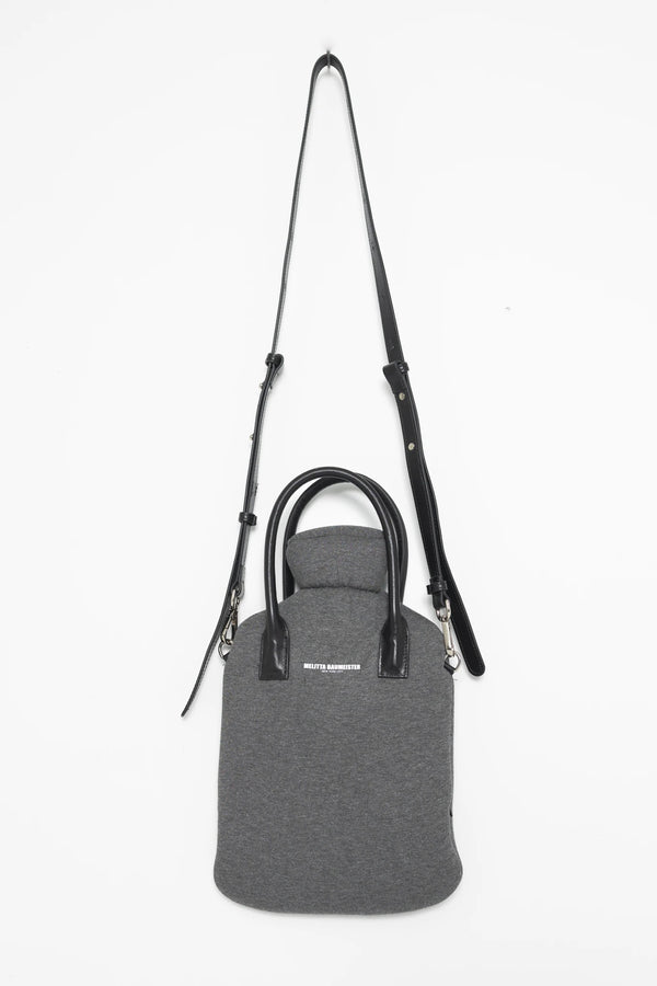 MELANGE-HOT-WATER-BOTTLE-SHAPED-BAG-WITH-BLACK-LEATHER-STRAPS-AND-LONG-CROSS-BODY-STRAP-FRONT-VIEW