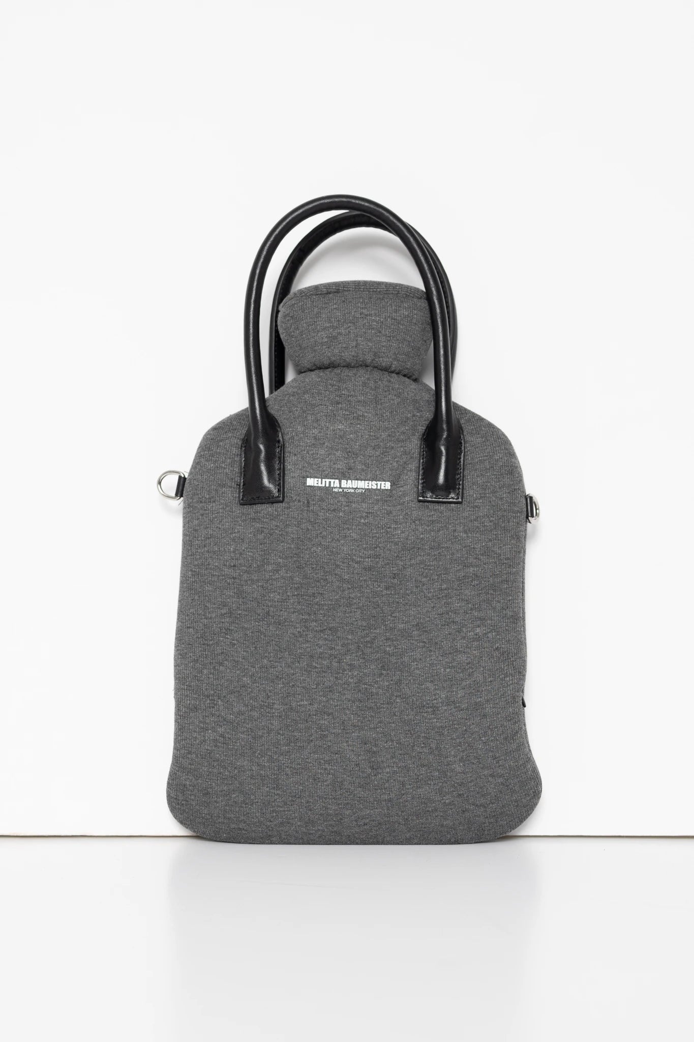 MELANGE-HOT-WATER-BOTTLE-SHAPED-BAG-WITH-BLACK-LEATHER-STRAPS-FRONT-VIEW