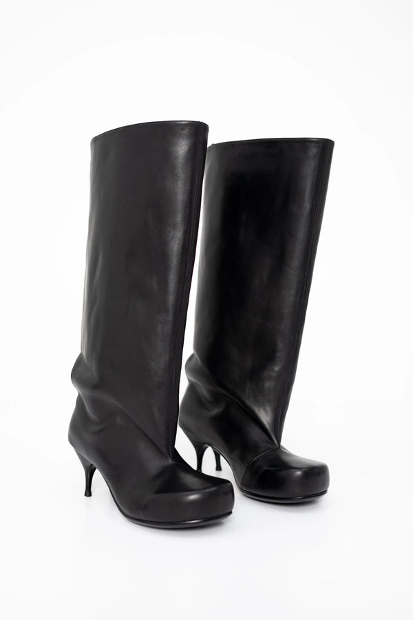 black-double-heel-boots-on-white-background-product-shot-three-quarter
