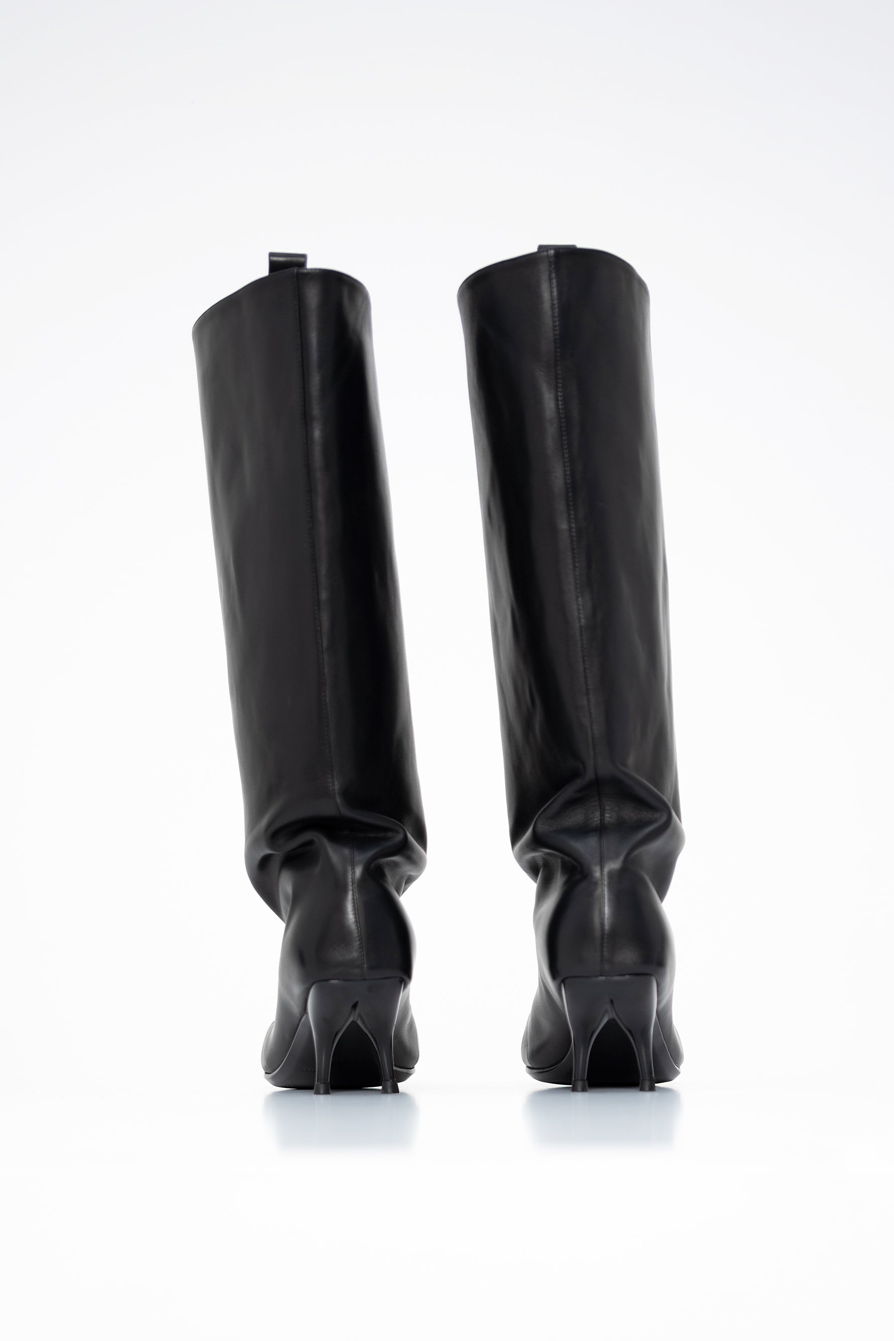 black-double-heel-boots-on-white-background-product-shot-back