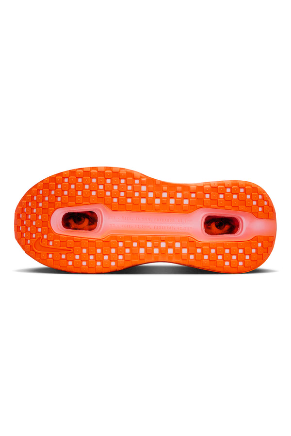 Orange and black sneaker on white background