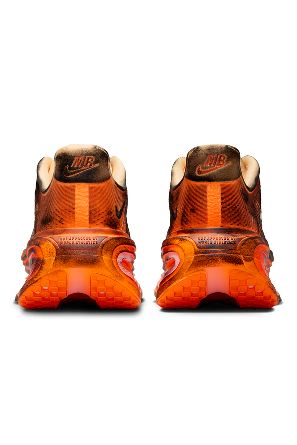 Orange and black sneaker on white background
