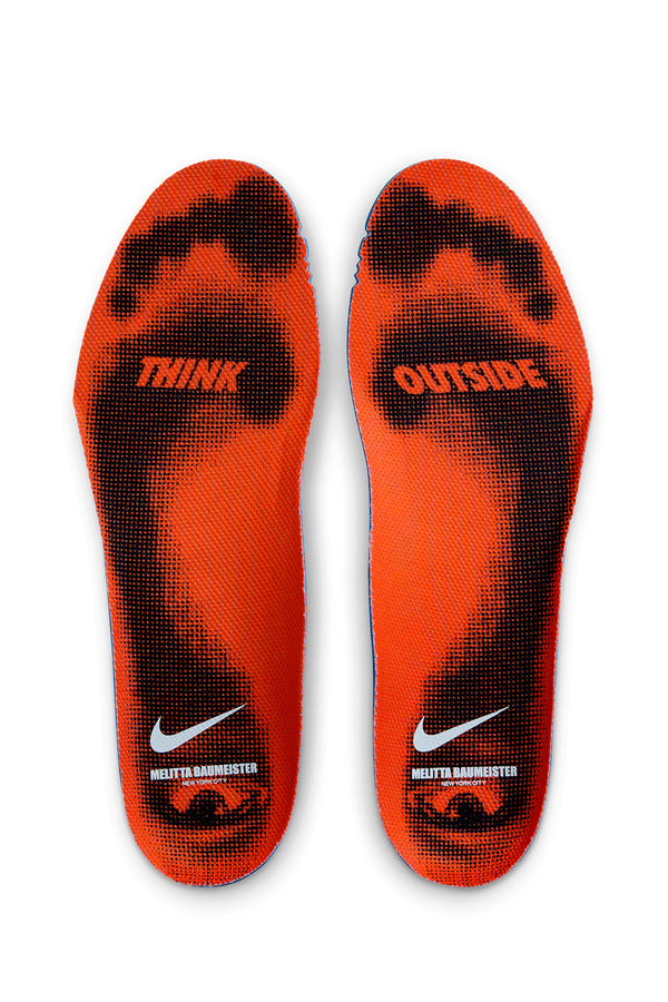 Orange and black soles on white background