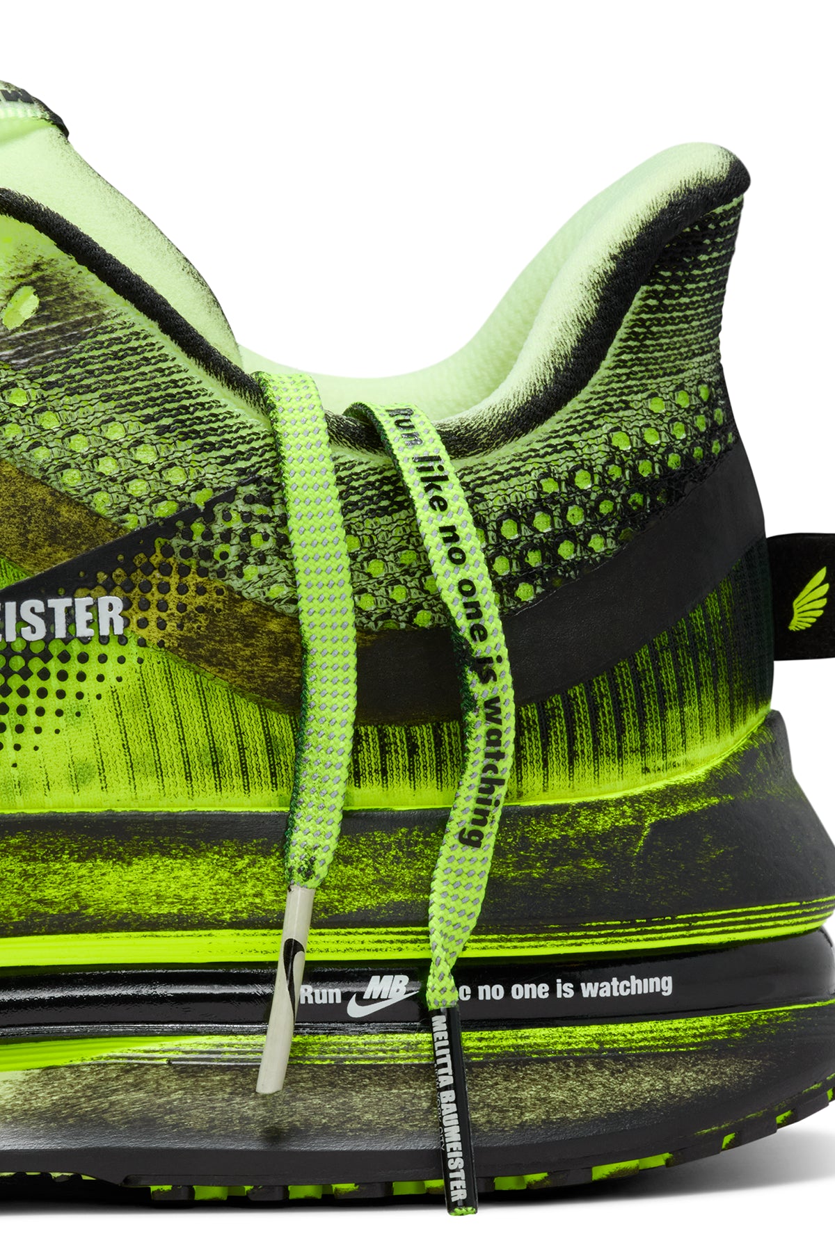 Neon green and black sneaker with text on a white background
