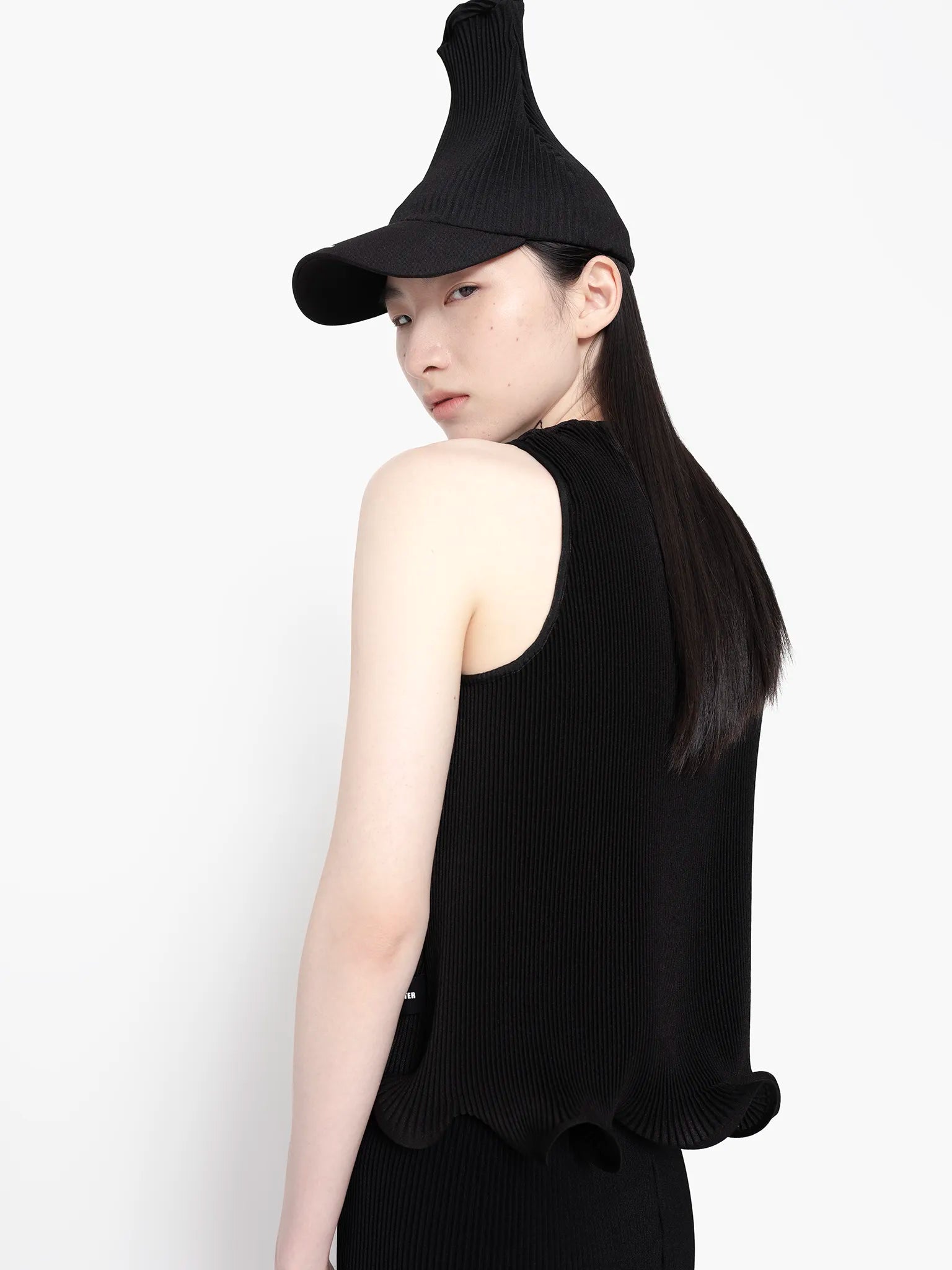 MELITTA-BAUMEISTER-Ripple-Ruffle-Tank-Black-CLOSE-UP-SLIGHT-LEFT-BACK-VIEW