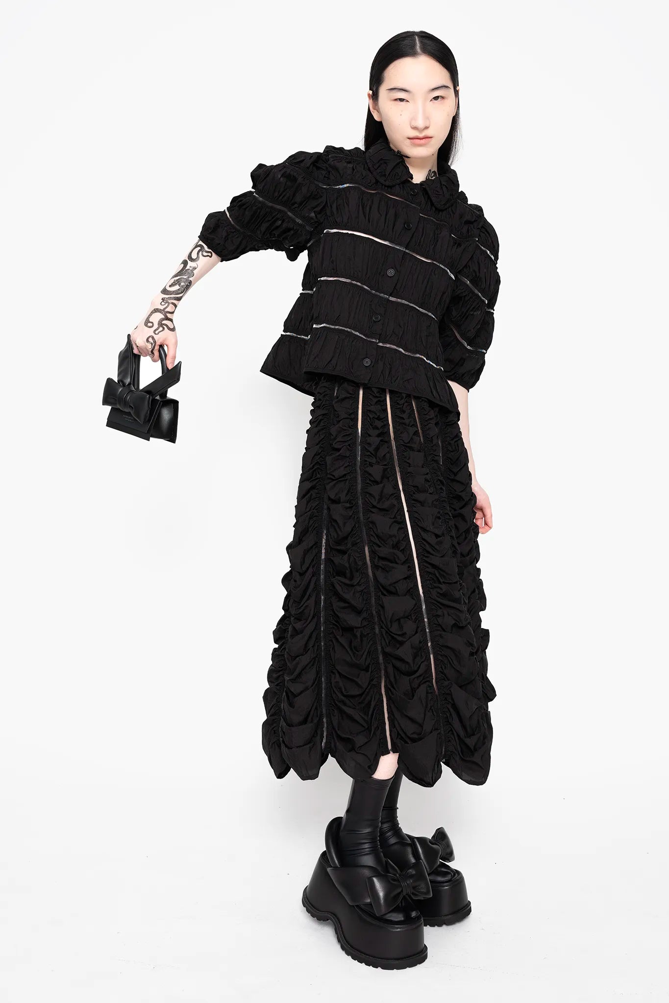 MELITTA-BAUMEISTER-Ruched-A-Line-Skirt-Black-FRONT-VIEW-RIGHT-ARM-EVEN-MORE-ELEVATED