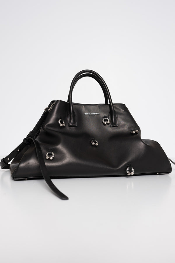 BLACK-COWHIDE-A-LINE-BAG-WITH-SHAOULDER-STRAPS-AND-CROSS-BODY-STRAPS-WITH-PIERCED-DETAIL-FRONT-VIEW