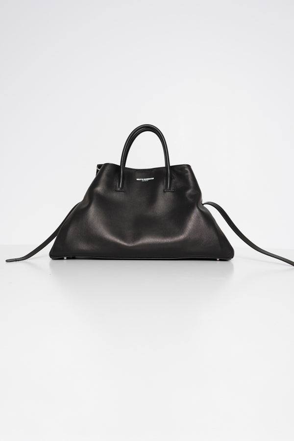 BLACK-COWHIDE-A-LINE-BAG-WITH-SHAOULDER-STRAPS-AND-CROSS-BODY-STRAPS-FRONT-VIEW