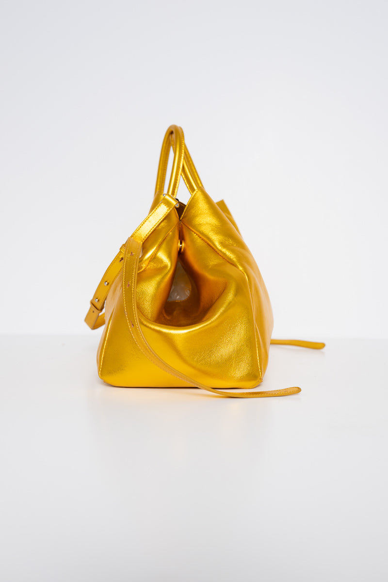 GOLD-COWHIDE-A-LINE-SHOPPER-WITH-SHOULDER-STRAPS-AND-CROSS-BODY-STRAP-SIDE-VIEW