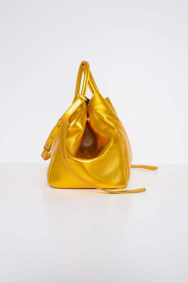 GOLD-COWHIDE-A-LINE-SHOPPER-WITH-SHOULDER-STRAPS-AND-CROSS-BODY-STRAP-SIDE-VIEW