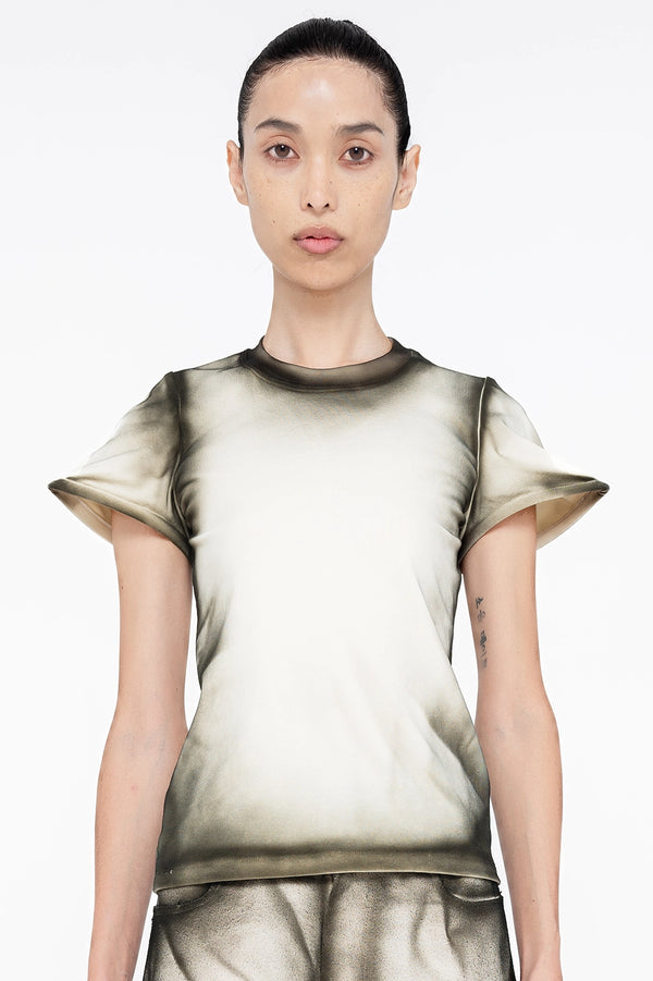 female-wearing-white-baby-tee-with-black-spray-paint-details-onwhite-background-closeup-front