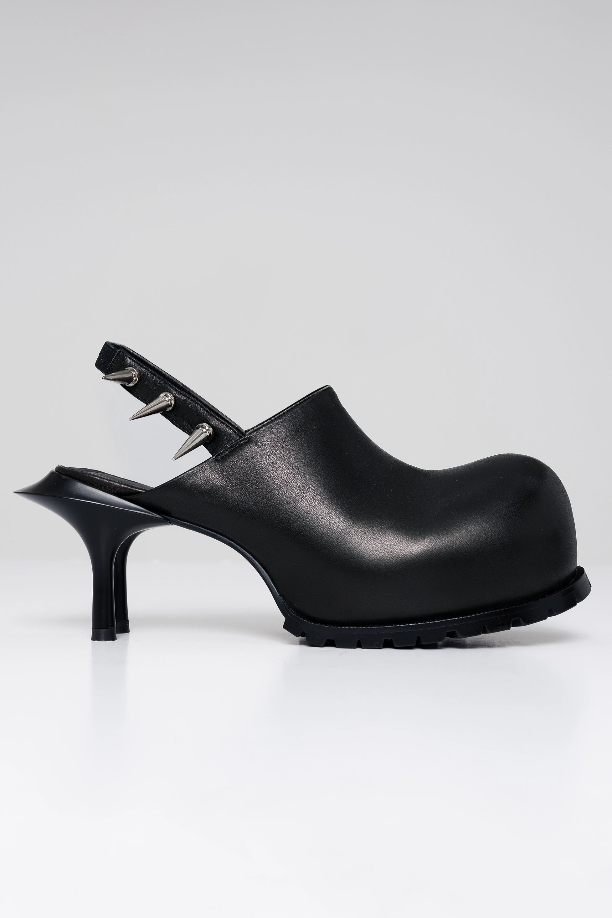 BLACK-DOUBLE-HEELED-MULES-WITH-SPIKE-DETAIL-ON-BACK-STRAP-SIDE-VIEW