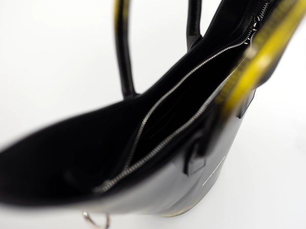 BLACK-PAINTED-POINTY-SHOULDER-BAG-WITH-SPIKED-CROSSBODY-STRAP-CLOSE-UP-VIEW