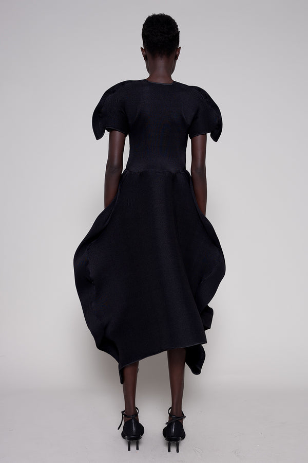 Black dress with puffed sleeves on a white background