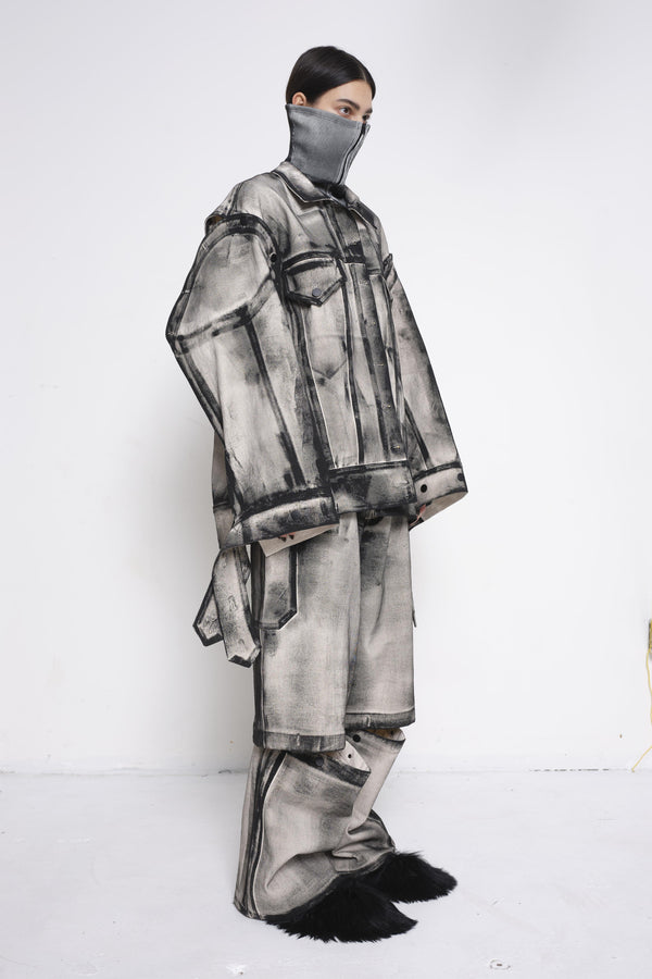 BRUNETTE-WOMAN-THREE-QUARTER-VIEW-FULL-BODY-WEARING-WHITE-DENIM-PAINTED-BLACK-AROUND-SEAMS-FULL-SET-OVERSIZED-DETACHABLE-ARMS-AND-LEGS